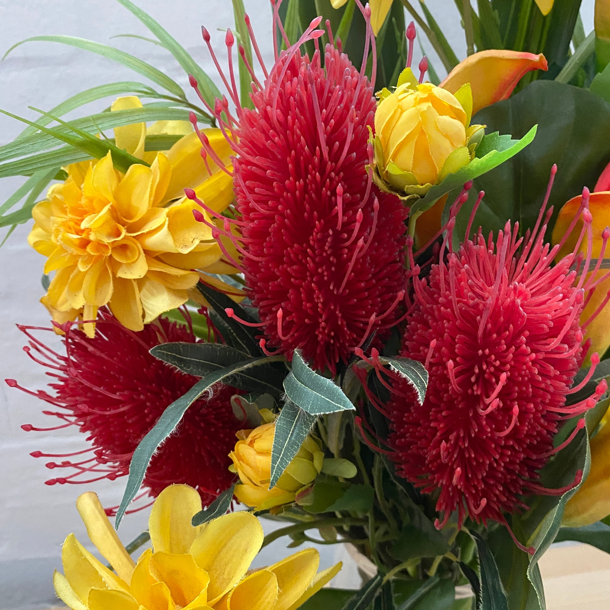 Artificial Floral Arrangement (Ex Rental) Reds and Yellows